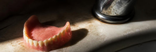 I’m 19 and need dentures: what are my options?