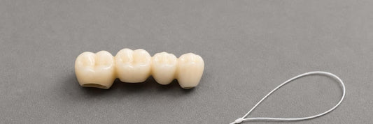 How to Floss Around a Bridge Without Damaging It