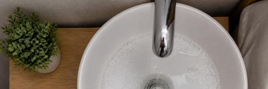 How do I brush my teeth without gagging?
